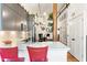Modern kitchen featuring an island, modern appliances, and a view into the dining room at 1535 Caraleigh Mills Ct # 111, Raleigh, NC 27603