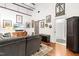 Cozy living room with hardwood floors, comfortable seating, and decorative accents at 1535 Caraleigh Mills Ct # 111, Raleigh, NC 27603