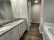 Bathroom featuring double vanity with granite countertops at 170 Starry Sky Dr, Benson, NC 27504
