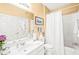 Clean bathroom features white vanity, toilet, and shower with white shower curtain at 1700 Tiffany Bay Ct # 303, Raleigh, NC 27609