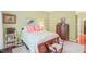 Calm bedroom featuring hardwood floors, a queen-size bed, and matching nightstands at 1700 Tiffany Bay Ct # 303, Raleigh, NC 27609