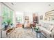 Cozy living room featuring stylish furnishings, large window and open floor plan at 1700 Tiffany Bay Ct # 303, Raleigh, NC 27609