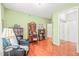 Comfortable living room with hardwood floors, a leather recliner and a lamp at 1700 Tiffany Bay Ct # 303, Raleigh, NC 27609