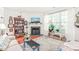 Inviting living room with fireplace, large window and open floor plan at 1700 Tiffany Bay Ct # 303, Raleigh, NC 27609