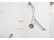 Modern shower with white tile, rainfall showerhead, and convenient grab bar at 1700 Tiffany Bay Ct # 303, Raleigh, NC 27609