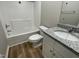 Clean bathroom featuring a tub-shower combo and a granite vanity at 186 Coharie Dr, Lillington, NC 27546
