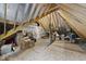 Unfinished attic space is open with exposed rafters and a plywood subfloor at 2040 Pleasant Forest Way, Wake Forest, NC 27587