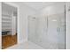 Luxurious primary bathroom with glass-enclosed shower and marble floors at 2040 Pleasant Forest Way, Wake Forest, NC 27587
