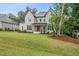 Beautiful home exterior with manicured front lawn and inviting entryway at 2040 Pleasant Forest Way, Wake Forest, NC 27587