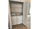 Convenient laundry closet with a washer and dryer, providing ease for laundry tasks at 207 Callum Pl, Cary, NC 27519