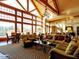 Elegant lobby featuring high ceilings, a chandelier, ample seating, and natural light at 207 Callum Pl, Cary, NC 27519
