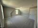 Spacious carpeted bedroom with a window providing natural light at 217 Busterfield Ct, Benson, NC 27504
