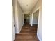 Inviting entryway with beautiful wood floors and a view into the spacious living area at 217 Busterfield Ct, Benson, NC 27504
