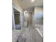 A view of the main bathroom with soaking tub, separate vanities, and entry to main bedroom at 217 Busterfield Ct, Benson, NC 27504