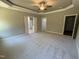 Spacious main bedroom with carpet and entrances to main bathroom and walk-in closet at 217 Busterfield Ct, Benson, NC 27504
