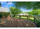 Large wooden backyard deck with an expansive lawn, perfect for outdoor enjoyment and entertaining at 2417 Ridgeford Ct, Fuquay Varina, NC 27526