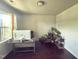 Bright home office with large window, hardwood floors, and desk with built-in storage at 2511 Kestrel Heights Ct Ct, Durham, NC 27703
