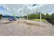 Community playground with colorful play structures, swings, and a soft ground cover for safe and active play at 2511 Kestrel Heights Ct Ct, Durham, NC 27703