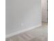 Neutral bedroom features carpet flooring, base trim, and a door at 257 North Maple Walk Dr # 218, Garner, NC 27529