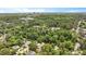 Scenic aerial view of homes nestled among trees, with the city skyline in the distance, highlighting the community's location at 2608 York Rd, Raleigh, NC 27608