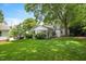 Large backyard with plenty of space for outdoor activities and a detached garage at 2608 York Rd, Raleigh, NC 27608