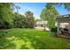 Private backyard retreat with lush landscaping and a serene atmosphere at 2608 York Rd, Raleigh, NC 27608