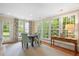 The dining area features large windows and a table with chairs at 2608 York Rd, Raleigh, NC 27608