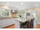 Spacious kitchen with granite countertops, stainless steel vent hood, and ample natural light at 2608 York Rd, Raleigh, NC 27608