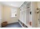 Mudroom features built-in shelving and storage baskets for organizing your belongings at 2608 York Rd, Raleigh, NC 27608