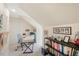Home office featuring white walls and trim, neutral carpet, and a built-in bookshelf with desk space at 2608 York Rd, Raleigh, NC 27608