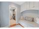 Well-organized walk-in closet featuring custom built-in shelves, drawers, and ample storage space at 2608 York Rd, Raleigh, NC 27608
