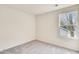 Bright bedroom with a view; showcasing carpet and a window at 2700 Barrington Dr, Raleigh, NC 27610