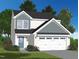Charming two-story home with white siding and a two-car garage, beautifully landscaped at 2700 Barrington Dr, Raleigh, NC 27610