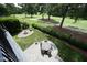 Overhead view of the patio with views of the backyard, golf course and fire pit at 2800 Charleston Oaks Dr, Raleigh, NC 27614