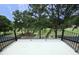 Balcony view overlooking golf course, trees, and landscape at 2800 Charleston Oaks Dr, Raleigh, NC 27614