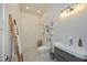 This bright and clean bathroom features a walk-in shower, modern vanity, and stylish tile work at 2800 Charleston Oaks Dr, Raleigh, NC 27614