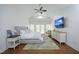 Bright main bedroom featuring vaulted ceilings, a ceiling fan and access to a private balcony overlooking the grounds at 2800 Charleston Oaks Dr, Raleigh, NC 27614