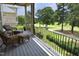 Outdoor patio sitting area with golf course views at 2800 Charleston Oaks Dr, Raleigh, NC 27614