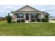 Charming one-story home with a well-manicured lawn and inviting front porch at 286 Beaver Tavern Dr, Benson, NC 27504
