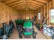 Organized shed interior with lawn equipment and tools at 286 Beaver Tavern Dr, Benson, NC 27504