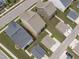 Aerial view of a neighborhood with sidewalks and neutral-colored houses and yards at 2915 Winter Crop Way, Apex, NC 27502