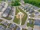 Overhead image of a neighborhood featuring a community garden, a gazebo, and walking paths at 2915 Winter Crop Way, Apex, NC 27502