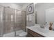 Modern bathroom features a glass-enclosed shower and contemporary fixtures for a spa-like experience at 2915 Winter Crop Way, Apex, NC 27502