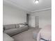 A stylish main bedroom with seating area, carpet, and windows at 2915 Winter Crop Way, Apex, NC 27502