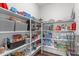 Walk-in pantry with organized shelving and ample storage space for food and household items at 2915 Winter Crop Way, Apex, NC 27502