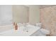 Bathroom featuring a single sink vanity with an ornate mirror, a shower and toilet at 3027 Maple Ave # A-1, Burlington, NC 27215