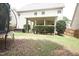 Backyard featuring a covered patio and a trampoline perfect for outdoor fun at 309 Forest Haven Drive Dr, Holly Springs, NC 27540