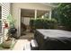 Backyard featuring a hot tub, grill, and covered patio perfect for entertaining at 309 Forest Haven Drive Dr, Holly Springs, NC 27540