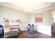 Bright dining room featuring a chandelier, trim accents, and versatile space at 309 Forest Haven Drive Dr, Holly Springs, NC 27540