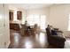 Charming eat-in kitchen area with dark wood cabinets and stainless steel appliances at 309 Forest Haven Drive Dr, Holly Springs, NC 27540